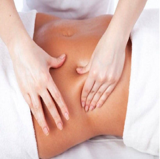 Lymphatic Drainage Massage Training—therapist performing gentle hand movements on client’s back to stimulate lymphatic flow and reduce swelling
